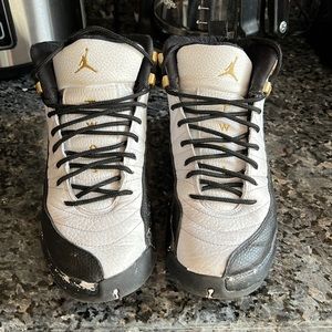 Jordan’s size 7Y black white and silver